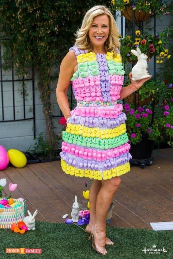 Woman wearing dress made out of marshmallow Peeps candy.