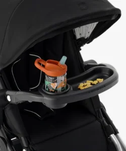 The Snack Tray accessory attached to the Mockingbird stroller