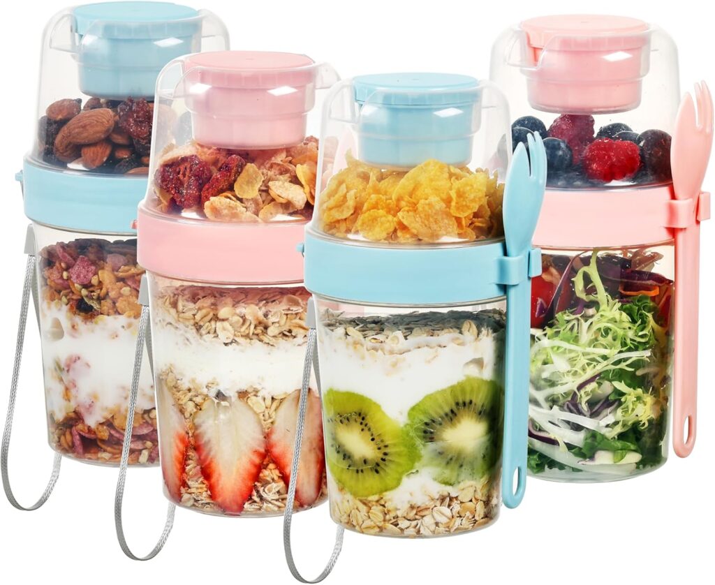 Colorful stackable containers filled with healthy snacks like yogurt, fruits, granola, and salad.