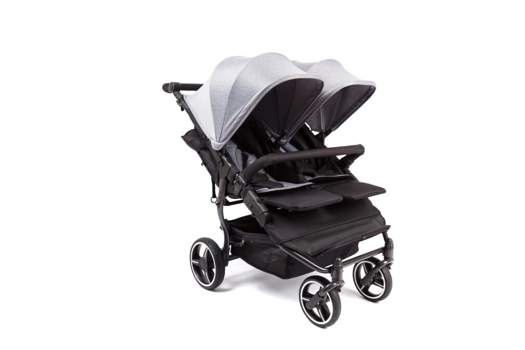 A double stroller on a white background