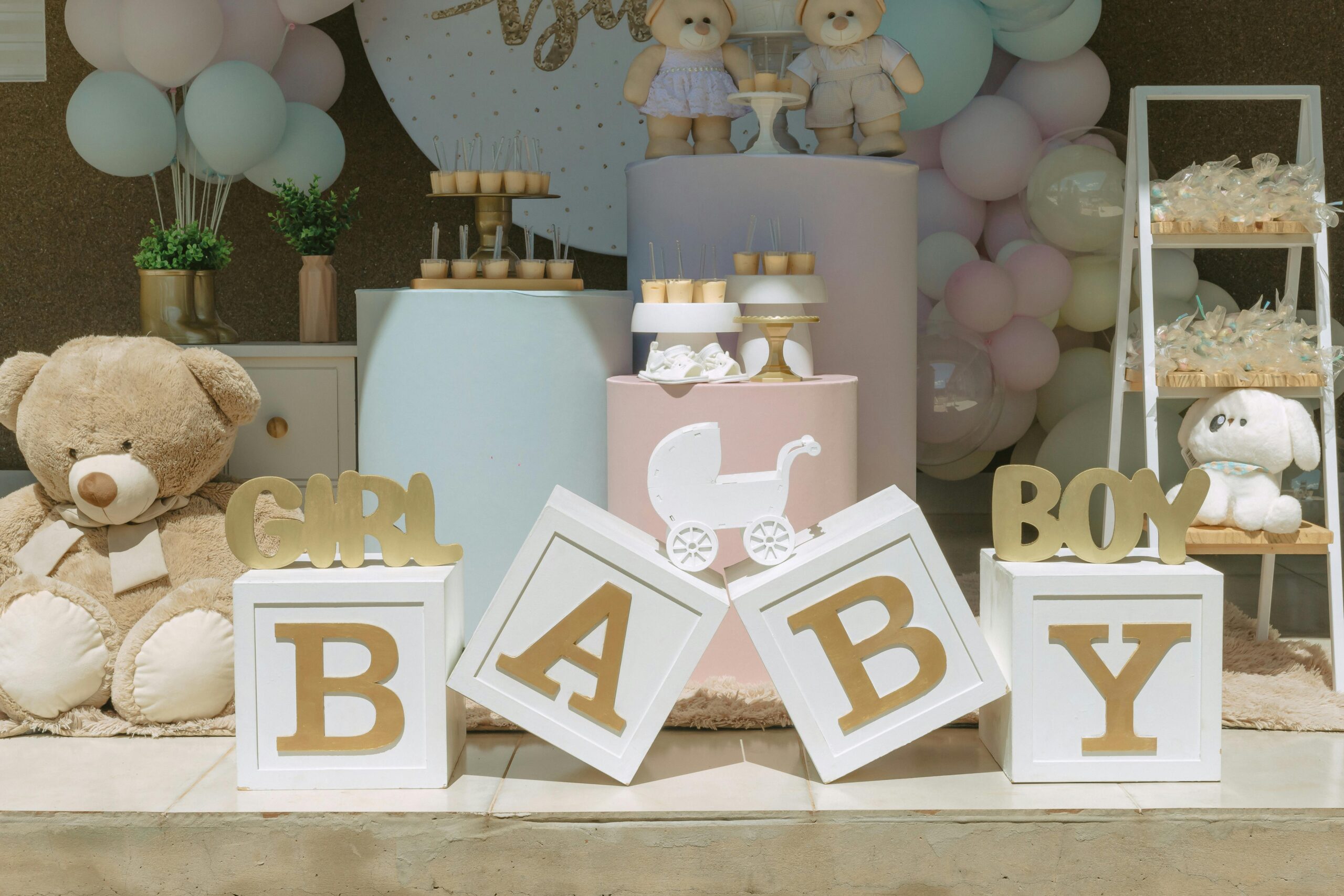 Baby Shower decorations on table with decor blocks spelling out Baby.