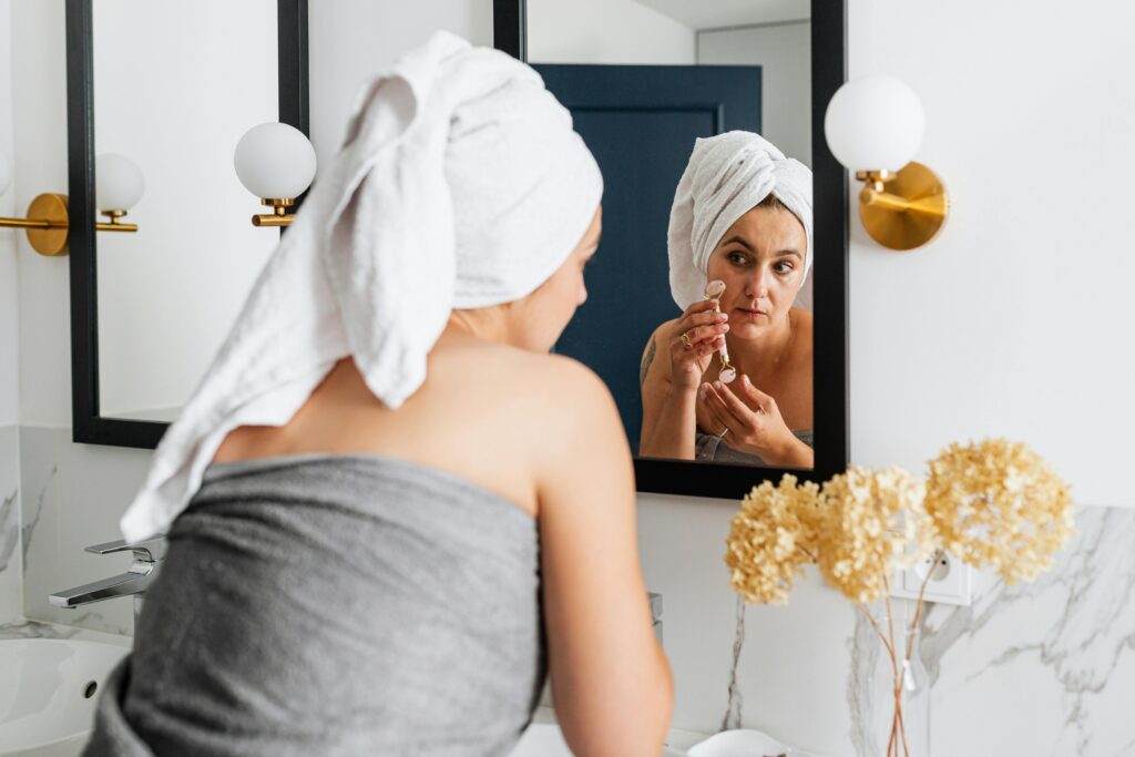 Mama getting ready for Summer day in bathroom.