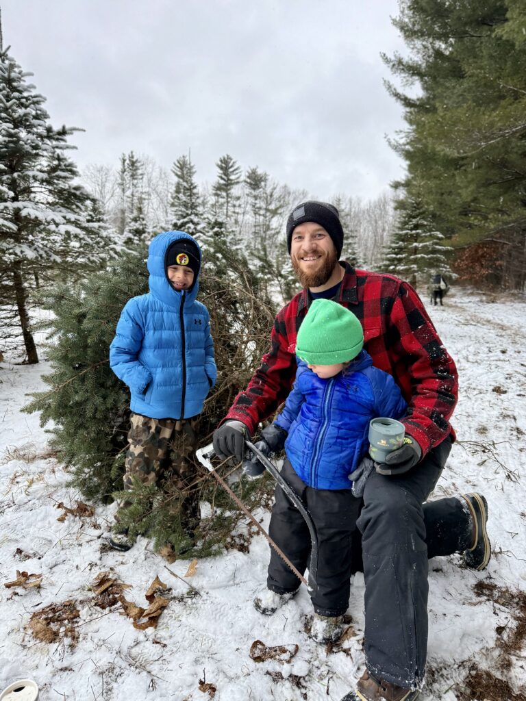 My family last year at our favorite U-Cut Christmas Tree farm in Metamora. 