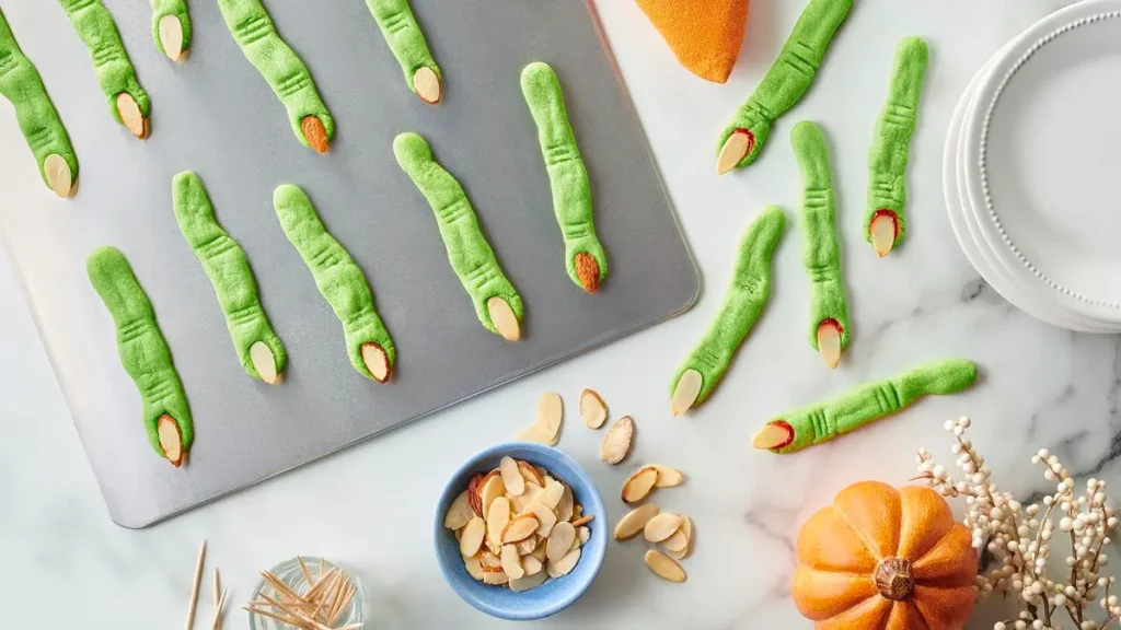 Witches Fingers Cookies — Pillsbury. Same idea, way less effort: refrigerated sugar cookie dough, four ingredients, makes sixty-five. Creepy through sickly green rather than blood, so this is the one I'd pick if the ages in the room are all over the place.