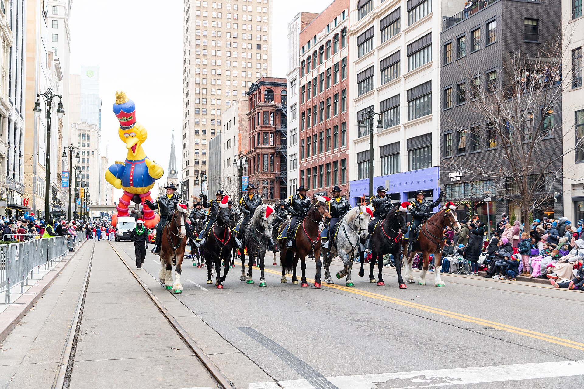 A balloon and mounted police move down Woodward Avenue during Americas Thanksgiving Parade in Detroit