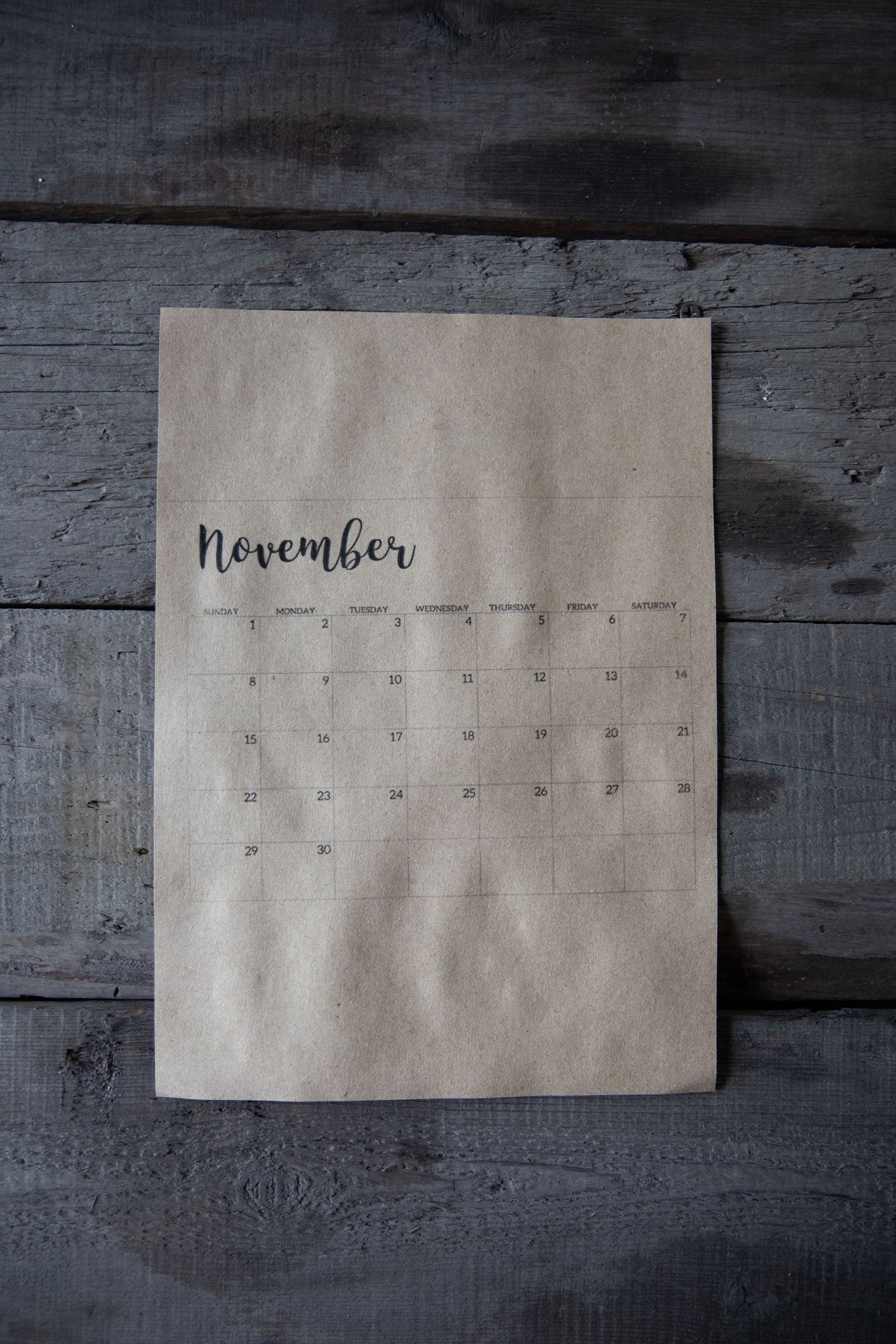 Black Friday 2026: a November calendar page on a wooden surface