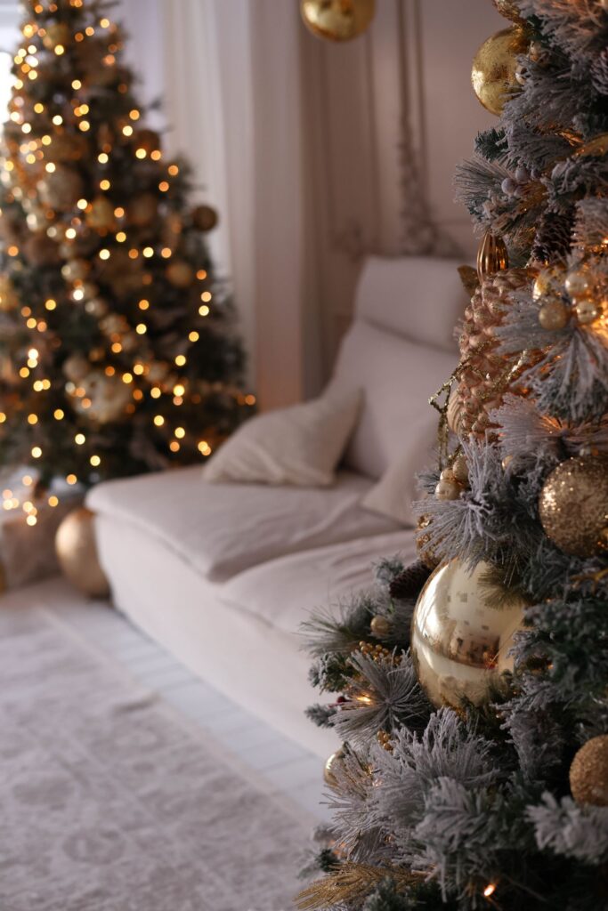 Christmas tree with warm lights in a living room