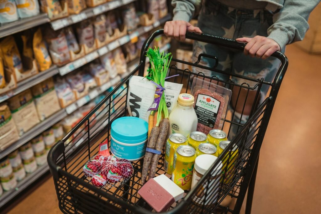 Shopping cart of groceries with Walmart+ with Sam's Club Plus